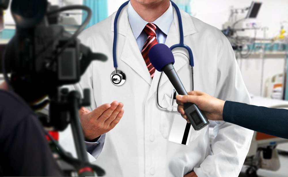 Doctor giving tv interview