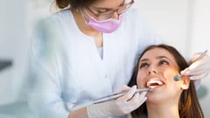 Dentist and patient in dentist office