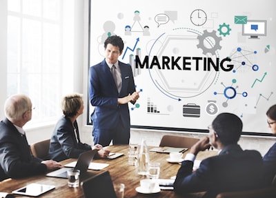 Employees having a marketing meeting in a conference room