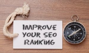 piece of paper with text reading "Improve your SEO ranking"