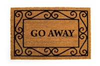 doormat reading "go away"