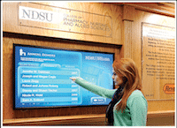 Woman looking at the RiseVision signage screen